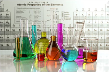 Glassware containing colored solutions Glassware with different colored solutions