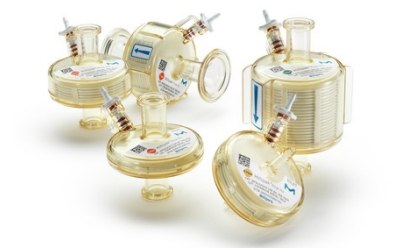Millipak Final Fill filters A collection of laboratory filtration units with various sizes and labels, equipped with tubes and clamps.