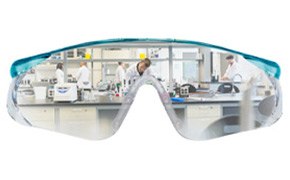 Lab safety is our priority Lab safety glasses reflecting lab bench and scientists