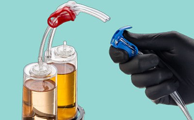 Slide the blue Velax® cutting clamp to an area free of droplets where tubes are still joined Slide the blue Velax® cutting clamp to an area free of droplets where tubes are still joined