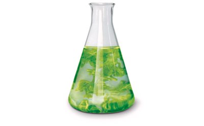 A clear glass Erlenmeyer flask filled with a green and yellow swirling liquid, isolated on a white background. A clear glass Erlenmeyer flask filled with a green and yellow swirling liquid, isolated on a white background.