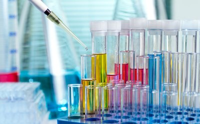 Biomedical polymers in lab Vials of colorful liquid
