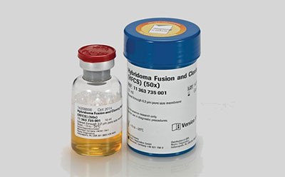Hybridoma Fusion and Cloning Supplement The image features two containers, a small glass vial with a red cap, containing a yellow liquid. The label includes the words “HYBRIDOMA,” “SERUM-FREE,” and some numerical codes. Second is a larger blue plastic container labeled “Hybridoma Fusion and Cloning Supplement (HFCS) (50x)” with additional text including a numerical code “B11 343 735 001” and the logo of GE Healthcare Life Sciences.