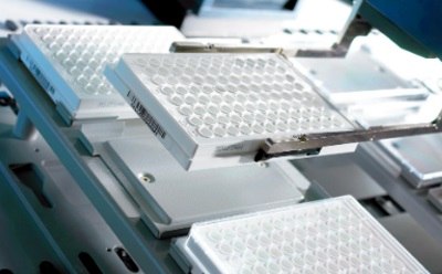 MultiScreen® Plate Machine An image of multiple MultiScreen® 96-well plates being handled by a MultiScreen® Plate Machine.