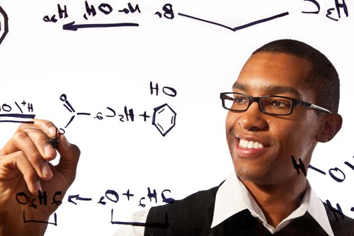 C-C Bond Formation Man drawing chemical reactions on glass