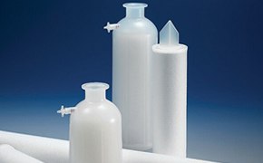 Clarification Prefilters  Three cylindrical white clarification filters designed to remove particles and microorganisms from pharmaceutical and biopharmaceutical process streams. The filters are set against a blue background.