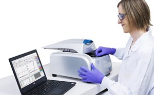 Pathogen Screening Kits, Instruments & Disposables Person wearing a labcoat, gloves, and protective glasses using an Assurance® GDS PickPen™ concentration device for PCR pathogen detection