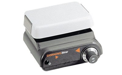 Stir plates A Corning Stirrer, a laboratory equipment with a white top and grey base, equipped with control knobs and labeled ‘CORNING Stirrer’, designed for mixing solutions in a lab setting.