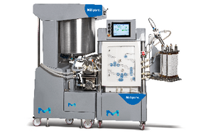 Mobius® FlexReady Solution for TFF An industrial pharmaceutical machine with a large mixing vessel, control panel, and various tubes and attachments.