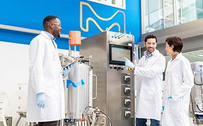 Molsheim M Lab Pilot Worker loading upstream chemicals for bioprocessing
