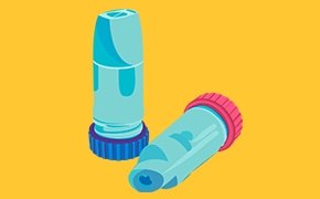 A close up of drug powder inhalers on a yellow background. A close up of drug powder inhalers on a yellow background.