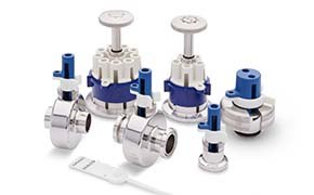 NovaSeptum® GO multi-use holders and security tag A collection of industrial valves on a white background, featuring seven valves with metallic bodies and blue elements. The valves vary in size and design, with two larger ones equipped with round handwheels. The assortment suggests diverse applications in flow or pressure control within industrial systems.