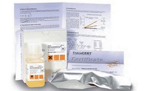 TraceCERT® Inorganic Standards for AAS, ICP and IC A collection of items related to analytical chemistry standards. It includes a bottle with a yellow label and several documents. One document is an accreditation document. Another paper shows printed graphs and text. The background is white and nondescript.