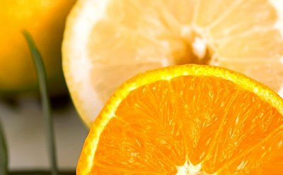 The image is of a half cut orange to indicate Vitamins. The image is of a half cut orange to indicate Vitamins.