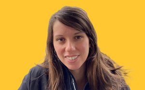 Jessica Freire Feitor Jessica Freire Feitor headshot on a vibrant yellow background