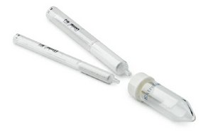 EXtrelut<sup>®</sup> NT Two white pens with silver clips and tips, one capped with a clear plastic cap and the other uncapped, are laid out on a plain white background.