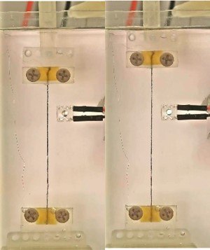An LED light in the external circuit lit up by stretching a coiled CNT yarn inside an electrolyte, boosting the voltage An LED light in the external circuit lit up by stretching a coiled CNT yarn inside an electrolyte, boosting the voltage